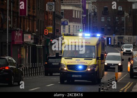 An ambulance seen in Dublin's city centre during level 5 COVID-19 lockdown. On Saturday, March 27, 2021, in Dublin, Ireland. (Photo by Artur Widak/NurPhoto) Stock Photo