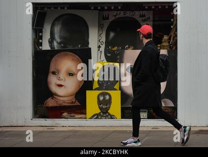 A man walks past the Decor Furniture Gallery in Dublin city center during level 5 COVID-19 lockdown. On Thursday, April 1, 2021, in Dublin, Ireland. (Photo by Artur Widak/NurPhoto) Stock Photo