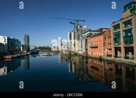 A general view of the Grand Canal Docks, an enclosed docking area that accomodate barges, with Boland's Mill and new Google office buildings (on right) seen in Dublin during level 5 COVID-19 lockdown. On Saturday, April 3, 2021, in Dublin, Ireland. (Photo by Artur Widak/NurPhoto) Stock Photo