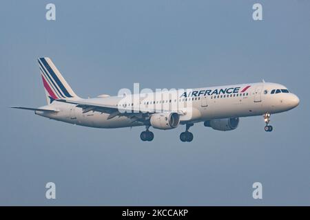 Air France Airbus A321 aircraft as seen flying on final approach for landing at Amsterdam Schiphol Airport AMS EHAM during a misty weather morning. The A321-200 airplane has the registration F-GTAD and is powered by 2x CFMI jet engines. Air France AIRFRANCE AFR is the flag carrier of France, a subsidiary of Air France-KLM Group member of SkyTeam aviation alliance group with the main hub at Charles de Gaulle Airport. According to local and international media in April 2021, the French government will inject up to 4 billion Euro to the airline, with the French state becoming the largest sharehol Stock Photo