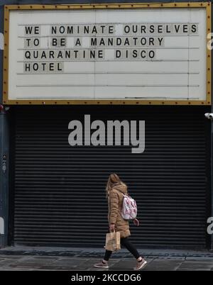 An uplifting notice on the message board reading 'We nominate ourselves to be a mandatory quarantine disco hotel' seen outside the Academy building in Dublin city center during level 5 COVID-19 lockdown. On Thursday, 8 April 2021, in Dublin, Ireland. (Photo by Artur Widak/NurPhoto) Stock Photo