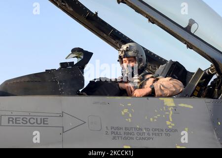 Pilot sits inside a U.S. Air Force F-16 Fighting Falcon. Stock Photo