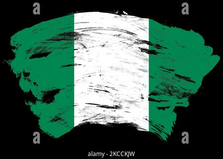 Nigeria flag on distressed black stroke brush background Stock Photo