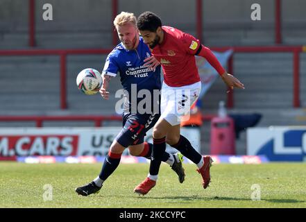 Oldham Athletic's Marcel Hilssner tussles with Kelvin Mellor of Morecambe during the Sky Bet League 2 match between Morecambe and Oldham Athletic at the Globe Arena, Morecambe, England on 17th April 2021. (Photo by Eddie Garvey/MI News/NurPhoto) Stock Photo