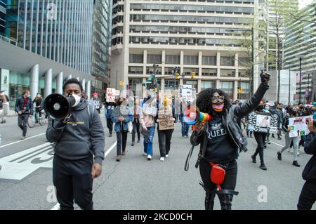 Protesters march around City Hall during a day of action in solidarity with Brooklyn Center and Chicago over the police killings of Daunte Wright and Adam Toledo, in Philadelphia, Pennsylvania, USA, on April 17, 2021. (Photo by Cory Clark/NurPhoto) Stock Photo