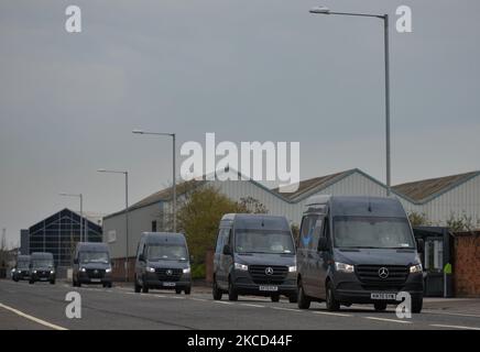 A line of Amazon Prime vans seen in the Titanic Quarter in Belfast. Packages are shipped to the delivery station from Amazon fulfillment and sorting centers and loaded onto vehicles for delivery to Amazon customers in the Belfast area. On Tuesday, April 20, 2021, in Belfast, Northern Ireland. (Photo by Artur Widak/NurPhoto) Stock Photo