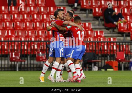 Roberto Soldado, of Granada CF, scores the first goal of his team during the La Liga match between Granada CF and SD Eibar at Nuevo Los Carmenes Stadium on April 22, 2021 in Granada, Spain. Football stadiums in Spain remain closed to fans due to the Coronavirus Pandemic. (Photo by Álex Cámara/NurPhoto) Stock Photo