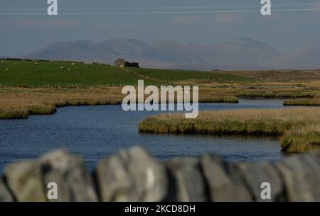 A view of Connemara, the road from Ballyconneely to Roundstone, in Co. Galway. On Thursday, 22 April 2021, in Derrygimla, Connemara, County Galway, Ireland. (Photo by Artur Widak/NurPhoto) Stock Photo