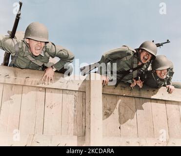 Soldiers topping the six foot wall at Camp Edwards, Massachusetts, circa 1942. Stock Photo