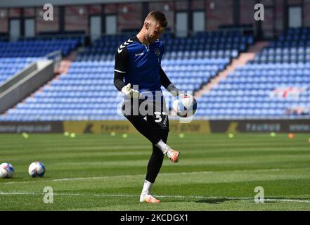 OLDHAM, UK. APRIL 24TH Oldham Athletic's Laurie Walker (Goalkeeper) warming up the Sky Bet League 2 match between Oldham Athletic and Grimsby Town at Boundary Park, Oldham, England on 24th April 2021. (Photo by Eddie Garvey/MI News/NurPhoto) Stock Photo