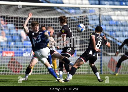 OLDHAM, UK. APRIL 24TH Oldham Athletic's Nicky Adams shoots for goal during the Sky Bet League 2 match between Oldham Athletic and Grimsby Town at Boundary Park, Oldham, England on 24th April 2021. (Photo by Eddie Garvey/MI News/NurPhoto) Stock Photo