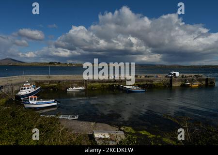 A general view of Roundstone Harbour during high tide. On Thursday, 29 April 2021, in Roundstone, Connemara, Co. Galway, Ireland. (Photo by Artur Widak/NurPhoto) Stock Photo