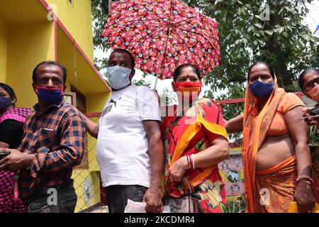 People in queue outside a vaccination centre to get their COVID-19 vaccine, in Guwahati, Assam, India on Friday, 30 April 2021. India enters the third phase of its coronavirus vaccination program it intends to vaccinate all those aged above 18 years from May 1 in the country. (Photo by David Talukdar/NurPhoto) Stock Photo