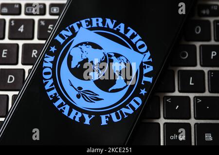 International Monetary Fund logo is displayed on a mobile phone screen photographed for illustration photo. Gliwice, Poland on May 5, 2021. (Photo by Beata Zawrzel/NurPhoto) Stock Photo