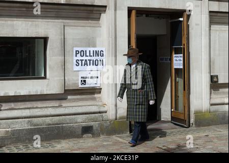 LONDON, UNITED KINGDOM - MAY 06, 2021: A man leaves a polling station at Methodist Central Hall in London after casting his vote in the local elections, on 06 May, 2021 in London, England. Millions of voters across England head to the polls today to decide on thousands of council seats, choose 13 mayors, including London, with many of the elections postponed from last year due to the Covid-19 pandemic. (Photo by WIktor Szymanowicz/NurPhoto) Stock Photo