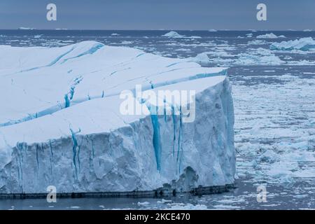 Icebergs near Ilulissat, Greenland. Climate change is having a profound effect in Greenland with glaciers and the Greenland ice cap retreating. (Photo by Ulrik Pedersen/NurPhoto) Stock Photo