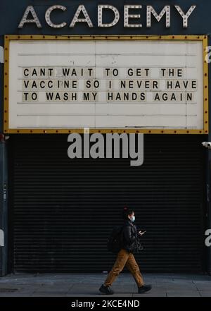 An uplifting notice on the message board reading 'Can't wait to get the vaccine, so I never have to wash my hands again' seen outside the Academy building in Dublin city center during the final days of the COVID-19 lockdown. On Friday, 7 May 2021, in Dublin, Ireland. (Photo by Artur Widak/NurPhoto) Stock Photo