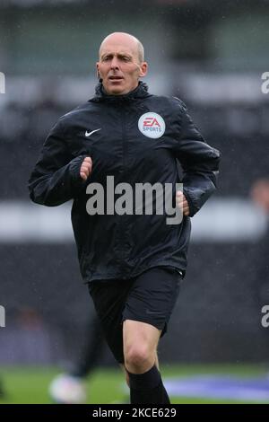 Mike Dean, the match referee, warming up before the Sky Bet Championship match between Derby County and Sheffield Wednesday at Pride Park, Derby on Saturday 8th May 2021. (Photo by Pat Scaasi/MI News/NurPhoto) Stock Photo