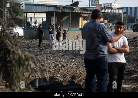 Palestinians inspect site of Israeli strike in Khan Younis Palestinians ...