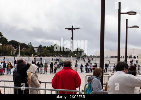 Pilgrims together in the sanctuary ,May 13, 2021, in Fátima, Portugal. The May International Anniversary Pilgrimage celebrates the 13 May 1917 apparition of Our Lady to the three shepherds, Lucia, Jacinta and Francisco.? (Photo by Nuno Cruz/NurPhoto) Stock Photo