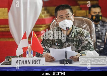 Chinese military attache, Colonel Chen Yongjing speaks about the joint salvage operation of sunken Indonesian Navy submarine KRI Nanggala 402 during press conference at Indonesia Navy Base in Denpasar, Bali, Indonesia on May 18 2021. Indonesian continues the salvage operation with the help from Chinese Navy in order to evacuate the victims and the main parts of the sunken Indonesian Navy submarine KRI Nanggala 402. The submarine found in 839 meter below sea level scattered in three big parts, however the main chamber and the 53 victims is still in search. A military submarine reported missing  Stock Photo