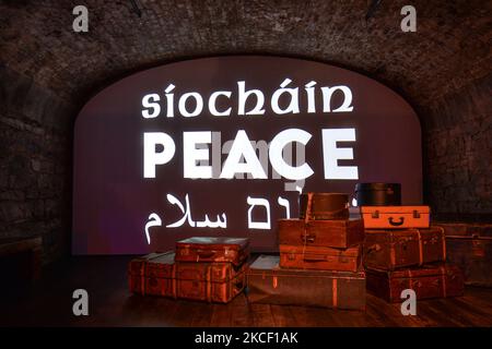 The word 'Peace' in Irish, English, Arabic and Hebrew as seen on a wall inside EPIC The Irish Emigration Museum in Dublin on Wednesday 19 May, as part of the Herstory's new Parallel Peace Project in Dublin launched on World Day for Cultural Diversity for Dialogue and Development. Syrian, Somali, Kenyan, Libyan activists took part in a project in Dublin that tells the story of women and girls on the island of Ireland whose lives have been hit by wars and social conflicts. On Thursday, 20 May 2021, in Dublin, Ireland. (Photo by Artur Widak/NurPhoto) Stock Photo