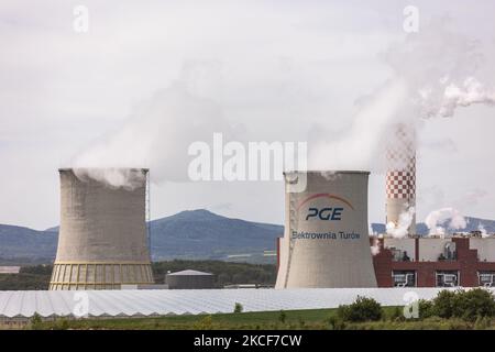 Operating cooling towers of the Turow coal-fired power station on May 25, 2021 in Bogatynia, Poland. At the request of Chekhov, the European Union ordered Poland on May 25, 2021 to close hard coal mines in Turow. This is the only workplace for the inhabitants of this region. The miners are threatening strikes and will not give up their jobs. (Photo by Krzysztof Zatycki/NurPhoto) Stock Photo