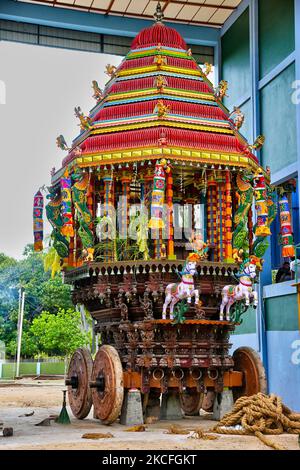 Large wooden chariot (ther) at the Ayyanar Kovil (Aiyanar temple) on Analaitivu Island in the Jaffna region of Sri Lanka. This temple is dedicated to Ayyanar (a Hindu deity particularly worshipped in South India and Sri Lanka among Malayalis and Tamils) and is famous for the wooden chariot which has hundreds of intricate wooden carvings depicting the mythology of the temple. (Photo by Creative Touch Imaging Ltd./NurPhoto) Stock Photo