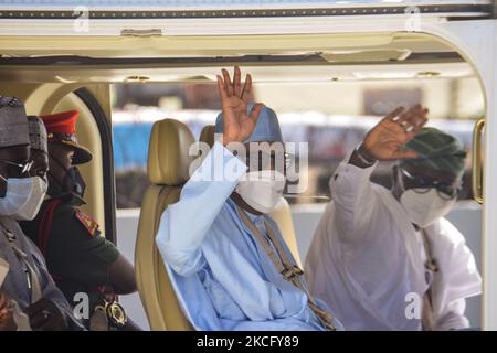 (L-R): Nigeria President, Muhammadu Buhari and Lagos State Governor, Babajide Sonwo-Olu gesture shortly after commissioning the Mobolaji Johnson Railway Station in Ebutemeta, Lagos, Nigeria, on June 10, 2021. President Muhammadu Buhari on Thursday visited Lagos for the inauguration of the 157-kilometer Lagos-Ibadan standard rail project at the Mobolaji Johnson railway station in Ebutte Metta. The Construction which started in March 2017, and test-running commenced in December 2020. The Ebute Metta Station, known as the Mobolaji Johnson Station, is the largest railway station in West Africa wit Stock Photo