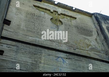 Remains of Nazi insignia on the unfinished sluice of the Masurian Channel are seen in Lesniewo, Poland on 4 June 2021 (Photo by Michal Fludra/NurPhoto) Stock Photo