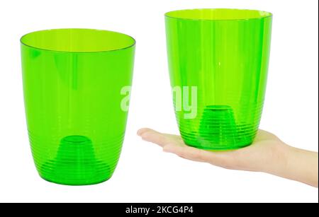 Green empty flower pot made of plastic. Isolated from the background Stock Photo