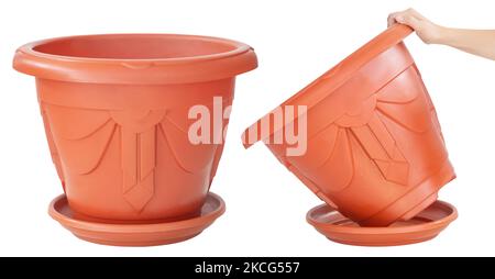 Large brown flower pot made of plastic. Isolated from the background Stock Photo