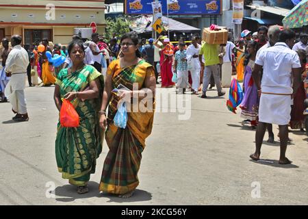 Crowds of Hindu devotees heading to the Nallur Kandaswamy Kovil (Nallur Temple) during the Nallur Ther Festival (Nallur Chariot Festival) at the Nallur Kandaswamy Kovil (Nallur Temple) in Jaffna, Sri Lanka. Hundreds of thousands of Tamil Hindu devotees from across the globe attended this festival. (Photo by Creative Touch Imaging Ltd./NurPhoto) Stock Photo