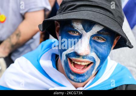 Scotland fans, known as ''The Tartan Army'' party in Leicester Square in London, UK, on June 18, 2021, before England versus Scotland match in the UEFA European Football Championship at Wembley Stadium on 18th June 2021. (Photo by Lucy North/MI News/NurPhoto) Stock Photo