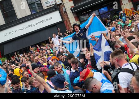 Scotland fans, known as ''The Tartan Army'' party in Leicester Square in London, UK, on June 18, 2021, before England versus Scotland match in the UEFA European Football Championship at Wembley Stadium on 18th June 2021. (Photo by Lucy North/MI News/NurPhoto) Stock Photo