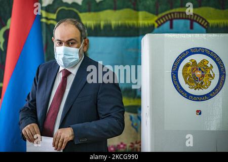 Nikol Pashinyan, Prime Minister of Armenia, prepares his ballot for voting in his polling station for the parliamentary elections of Armenia. (Photo by Celestino Arce/NurPhoto) Stock Photo