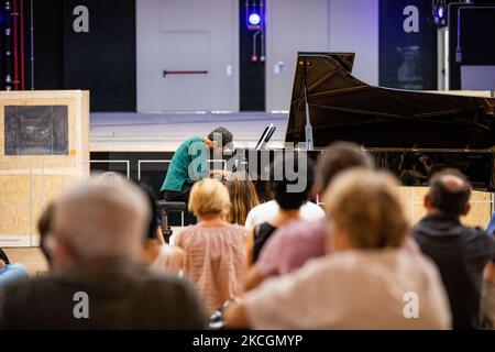 Vincenzo Parisi performs live for Piano City at the construction site of the Teatro Lirico on June 26, 2021 in Milan, Italy. (Photo by Alessandro Bremec/NurPhoto) Stock Photo