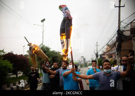 Student cadre burns effigy of Prime Minister KP Sharma Oli during a Protest against the dissolution of parliament in Kathmandu, Nepal on June 30, 2021. (Photo by Rojan Shrestha/NurPhoto) Stock Photo