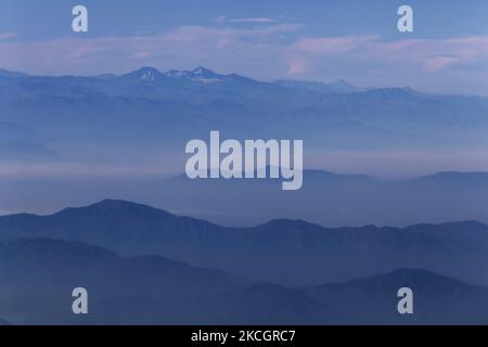 Aerial view of the Andes Mountain range seen through a shroud of morning mist in Chile on March 13, 2021. (Photo by Creative Touch Imaging Ltd./NurPhoto) Stock Photo
