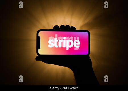 Stripe logo is seen displayed on a phone screen in this illustration photo taken in Krakow, Poland on July 3, 2021. (Photo illustration by Jakub Porzycki/NurPhoto) Stock Photo