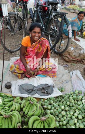 Merchant at the Shaniwaar Subzi Bazaar, which is the largest fruit and vegetable market in the Indian city of Nagpur, Maharashtra, India. (Photo by Creative Touch Imaging Ltd./NurPhoto) Stock Photo