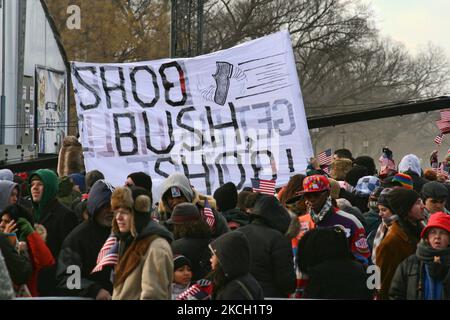 Large group of protestors at an anti-George W. Bush protest during the inauguration of President Barack Obama in Washington D.C., United States of America, on January 20, 2009. (Photo by Creative Touch Imaging Ltd./NurPhoto) Stock Photo
