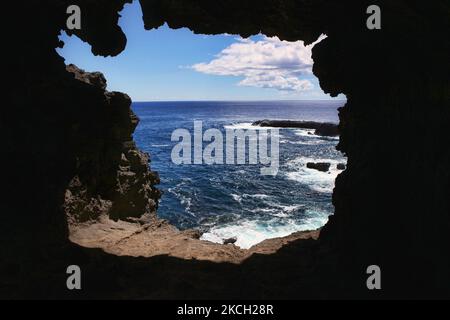 View from inside a lava tube looking out onto the Pacific Ocean on Easter Island, Chile, on March 16, 2010. (Photo by Creative Touch Imaging Ltd./NurPhoto) Stock Photo