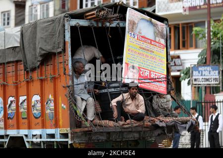 Hindu pilgrims packed in the back of a truck on route to Amarnath Cave for the Amarnath Yatra pilgrimage in Pahalgam, Kashmir, India, on June 27, 2010. (Photo by Creative Touch Imaging Ltd./NurPhoto) Stock Photo