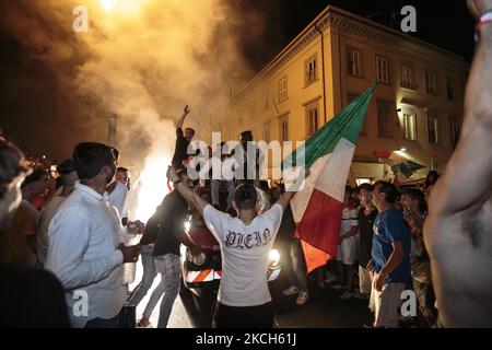 Italians fans celebrating in the streets of Pisa, Italy, on July 11, 2021. Italy won the UEFA European Championship for the first time since 1968 as goalkeeper Gianluigi Donnarumma saved two England penalties. Both sides had fought out a 1-1 extra-time draw at Wembley on Sunday. (Photo by Enrico Mattia Del Punta/NurPhoto) Stock Photo