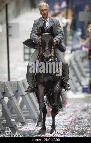 Crew and cast member are seen on set as filming for the upcoming Indiana Jones movie continues in the city centre on July 16, 2021 in Glasgow, Scotland. Filming for the blockbuster new Indiana Jones movie staring Harrison Ford is set to continue in Glasgow until the end of the month. (Photo by Ewan Bootman/NurPhoto) Stock Photo