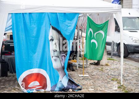 Flag with the face of the Turkish president Recep Tayip Erdogan next to the flag of the grey wolves. A group of supporters of the AK Parti and the turkish president Recep Tayip Erdogan protested on July 15, 2021 in Munich, Germany. They remembered the victims of the failed coup of 2016 and celebrated it as day of democracy. (Photo by Alexander Pohl/NurPhoto) Stock Photo