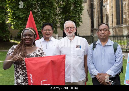 LONDON, UNITED KINGDOM - JULY 20, 2021: Jeremy Corbyn MP (3L) takes part in a protest outside the Houses of Parliament demanding 15% pay increase for health workers on July 20, 2021 in London, England. The Department for Health and Social Care has recommended that NHS staff in England should receive a 1% pay increase this year despite the unprecedented pressure experienced by the health workers during the coronavirus pandemic. (Photo by WIktor Szymanowicz/NurPhoto) Stock Photo