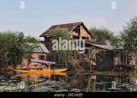 Floating house rests on the backwaters along Nigeen Lake in Srinagar, Kashmir, India, on June 26, 2010. (Photo by Creative Touch Imaging Ltd./NurPhoto) Stock Photo