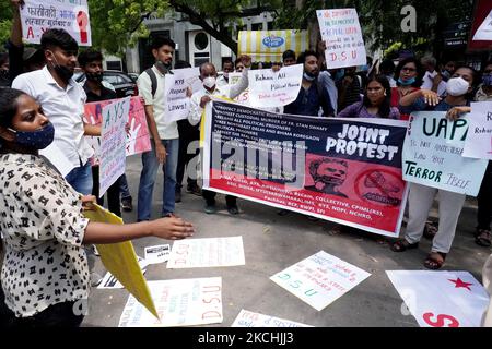 Activists hold banners and placards during a protest demanding justice for 84-year-old Indian Christian priest and activist Father Stan Swamy, in New Delhi, India on July 23, 2021. (Photo by Mayank Makhija/NurPhoto) Stock Photo